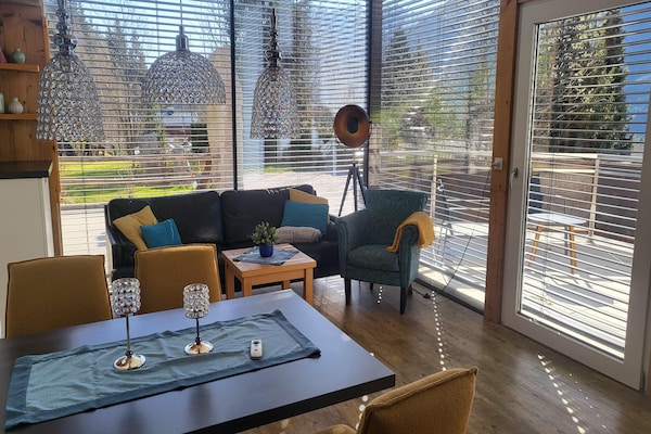 Rustiek appartement met bergzicht & wellness aan de golfbaan in Neukirchen - thumbnail 2