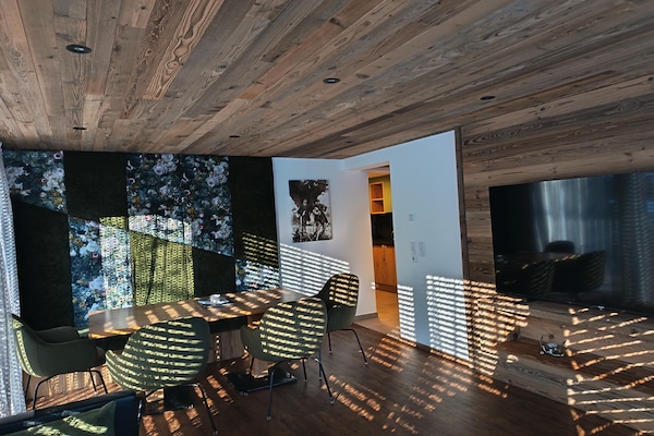Rustiek appartement met bergzicht & wellness aan de golfbaan in Neukirchen - thumbnail 3