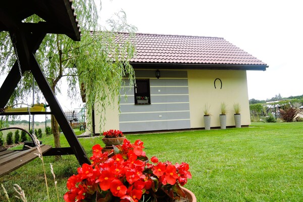 Knus vakantiehuis aan de golfbaan in Kolczewo, 3 km van het Oostzeestrand - thumbnail 3