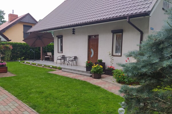 Vrijstaand vakantiehuis bij het meer in Morzyczyn, 200m van strand - thumbnail 1