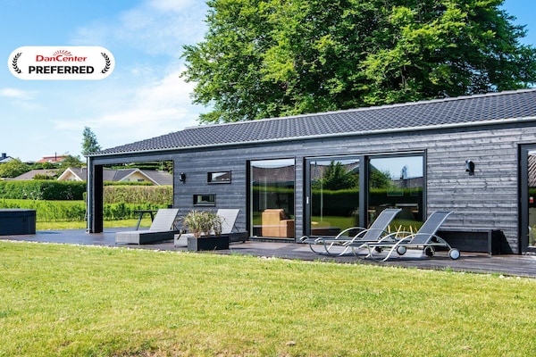 Luxe vrijstaand vakantiehuis met binnen- en buitenwhirlpool op 800m van zee - thumbnail 1