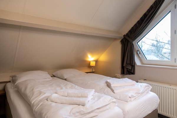 Charmante bosbungalow in Mook met tuin, huisdieren welkom - thumbnail 4