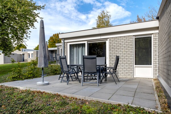 Wellnessbungalow in autovrij park, 4 km van Valkenburg - thumbnail 1
