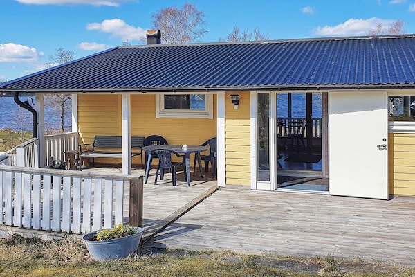 Vrijstaand vakantiehuis aan meer Holsjön met roeiboot en sauna - thumbnail 5