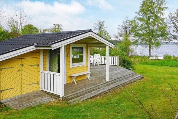 Vrijstaand vakantiehuis aan meer Holsjön met roeiboot en sauna - thumbnail 6