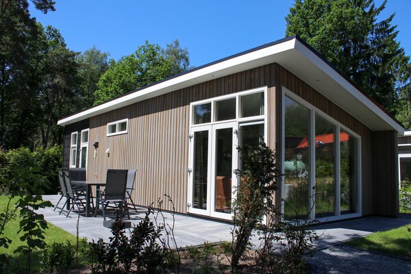Gezinsvriendelijk chalet met uitzicht op speeltuin in Hoenderloo - thumbnail 6