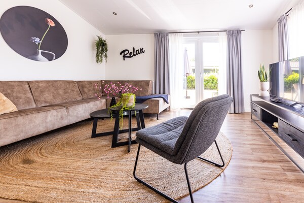 Modern chalet aan het water met hondenvriendelijke tuin in Veldhoven - thumbnail 6