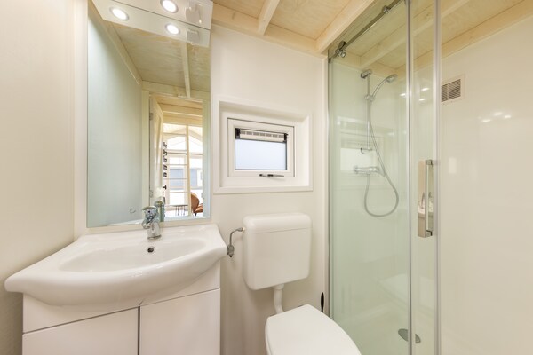 Tiny house Tolplas 19: compact genieten aan het water in Twente - thumbnail 6