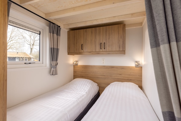 Tiny house Tolplas 19: compact genieten aan het water in Twente - thumbnail 5