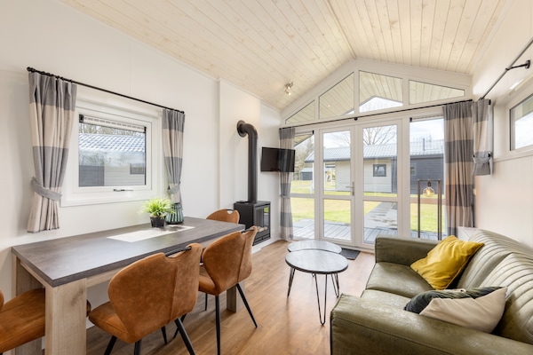 Tiny house Tolplas 19: compact genieten aan het water in Twente - thumbnail 2