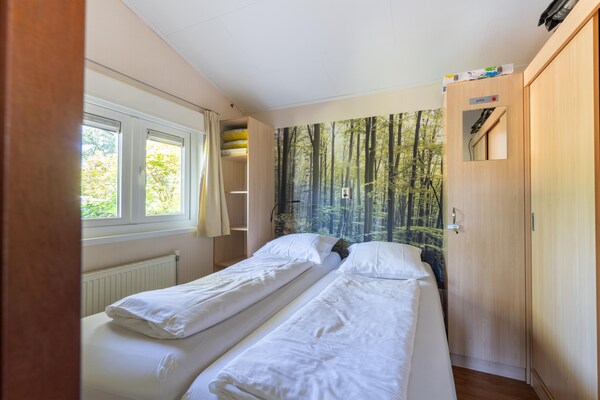 Vrijstaand vakantiehuis in bosrijke omgeving bij Voorthuizen - thumbnail 3