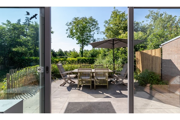 Vrijstaand vakantiehuis met grote tuin op 5 minuten van strand Nieuwvlietbad - thumbnail 6