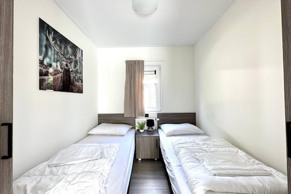 Moderne boshut voor 6 personen op Vakantiepark De Rimboe in Hoenderloo - thumbnail 4