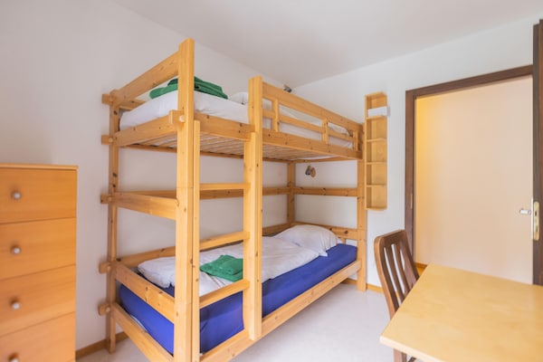 Cransalpin: luxe appartement met zwembad direct aan de piste in Crans-Montana - thumbnail 3