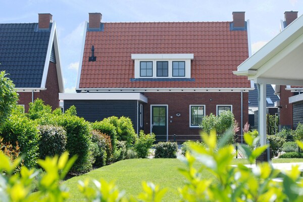 Charming Beveland: Modern vakantiehuis aan het meer in Zeeuws Colijnsplaat - thumbnail 2