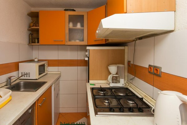 Kompakt appartement met panoramisch uitzicht over Gruž Baai - thumbnail 4