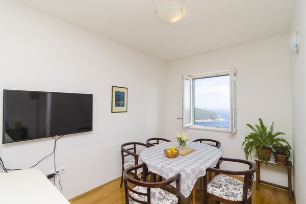 Appartement met terras en zeezicht op loopafstand van de oude stad Dubrovnik - thumbnail 4