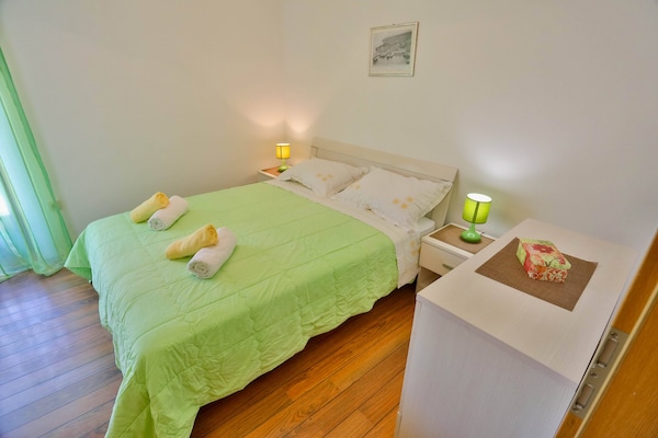 4-persoons appartement met tuin bij het strand in Sutivan - thumbnail 6