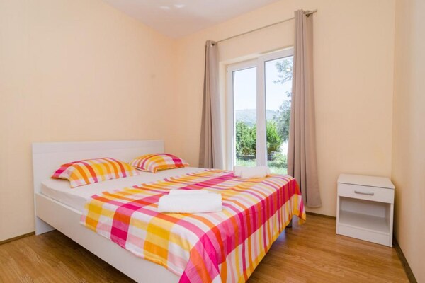 Knus appartement met terras en tuinzicht in rustig Lapad, dichtbij strand - thumbnail 6