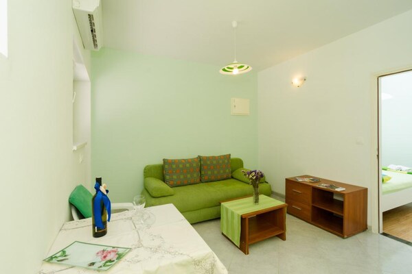 Rustiek appartement met terras en tuinzicht op loopafstand van strand - thumbnail 5