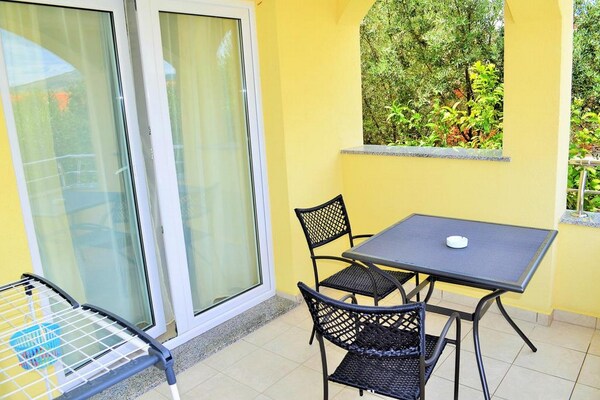 Appartement Sandra met zeezicht, terras en gedeeld zwembad op 100m van strand - thumbnail 5