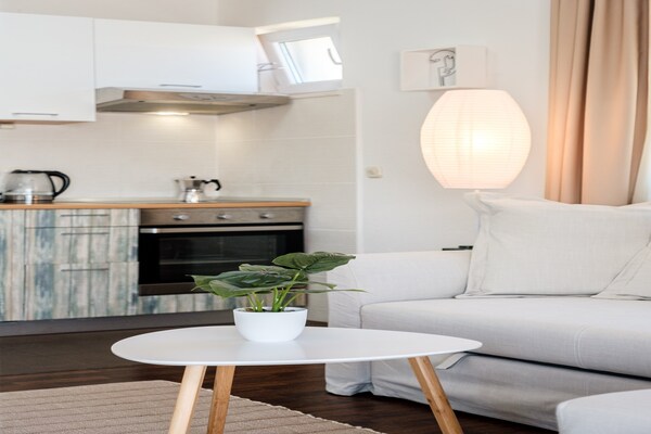 Zonsondergang appartement met balkon en panoramisch zeezicht in Postira - thumbnail 3
