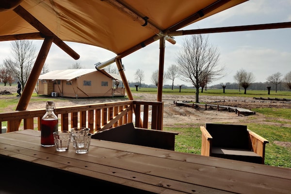 Luxe glampingtent met uitzicht op Kuinderbos in Bant, Flevoland - thumbnail 5