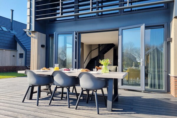 Luxe watervilla met aanlegsteiger aan het Slotermeer in Friesland - thumbnail 3