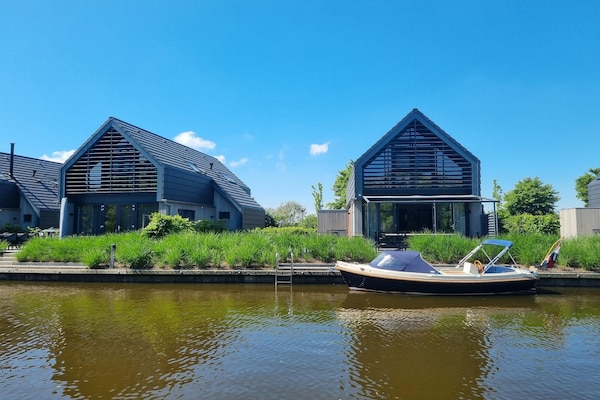 Luxe watervilla met aanlegsteiger aan het Slotermeer in Friesland - thumbnail 1