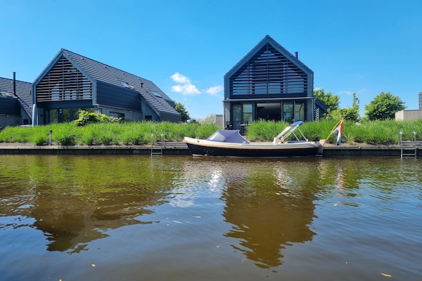 Luxe watervilla met aanlegsteiger aan het Slotermeer in Friesland - thumbnail 2