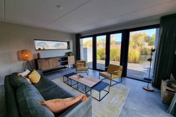 Luxe watervilla met aanlegsteiger aan het Slotermeer in Friesland - thumbnail 4