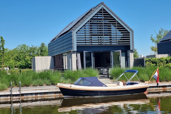 Watervilla Achttjin: Luxe aan het Slotermeer met privé-aanlegsteiger - thumbnail 1