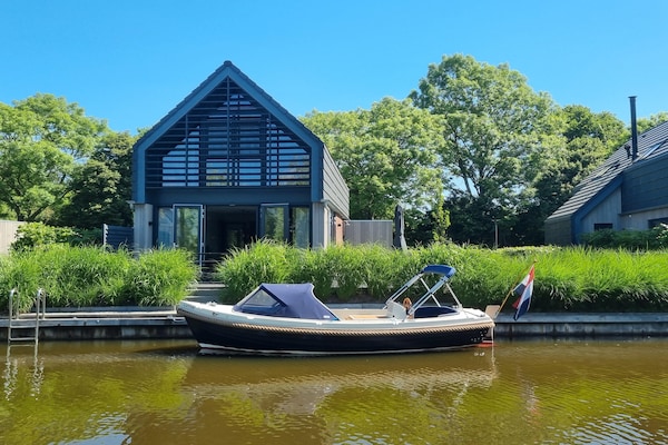 Watervilla Fiif: luxe familieverblijf direct aan het Slotermeer - thumbnail 1
