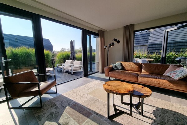 Luxe watervilla met aanlegsteiger aan het Slotermeer in Friesland - thumbnail 5