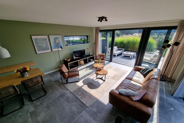 Luxe watervilla met aanlegsteiger aan het Slotermeer in Friesland - thumbnail 6