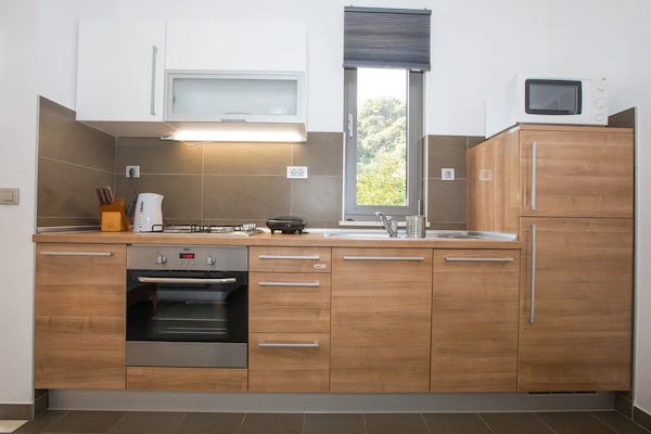 Knus appartement met terras in Lapad, op 300 meter van het strand - thumbnail 3