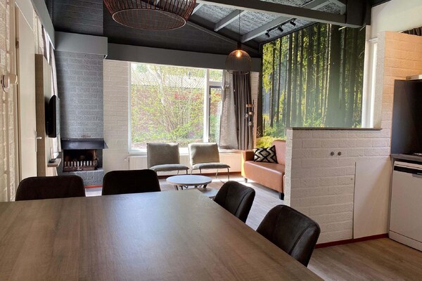 Gereno­veerde water­bungalow met roeiboot op Vakantie­park Weerter­bergen - thumbnail 4