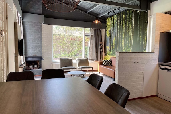 Gereno­veerde water­bungalow met open haard en roeiboot in Weerterbergen - thumbnail 4