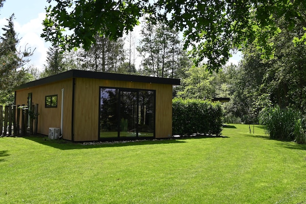 Wellnesslodge Scholekster: privé-jacuzzi in Drentse natuur - thumbnail 1