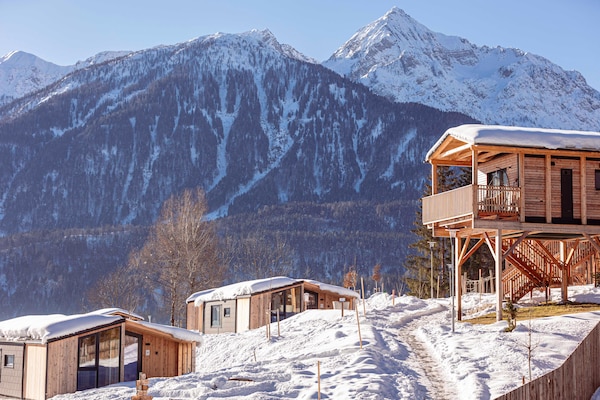 Moderne boomhut in autovrij resort in Kötschach-Mauthen - thumbnail 5
