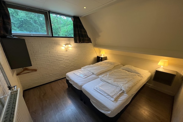 Vosseven 73 Maretak: Modern vakantiehuis in bosrijk Limburg voor 6 personen - thumbnail 1