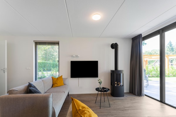 Boschhuis Boucle: vrijstaand vakantiehuis met uitzicht op water in Lochem - thumbnail 2