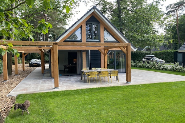 Boschhuis Boucle: vrijstaand vakantiehuis met uitzicht op water in Lochem - thumbnail 6