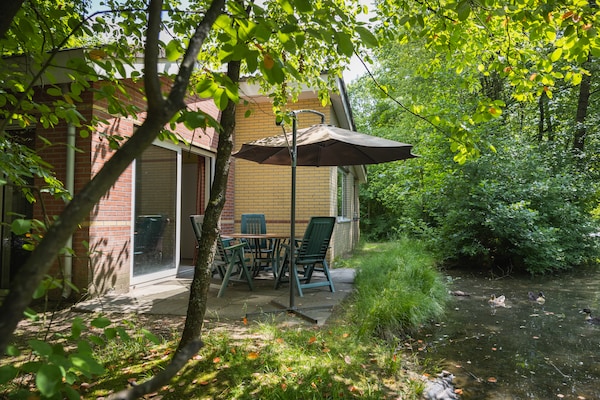 Vredige bosbungalow op de Veluwe met sauna en tuin - thumbnail 6