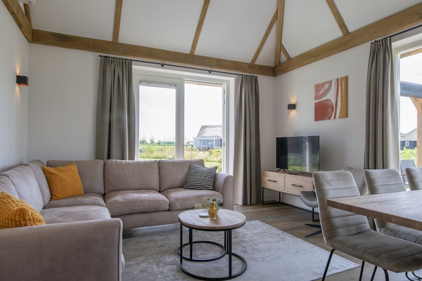 Luxe rietgedekte villa met vloerverwarming op vakantiepark De Heihorsten - thumbnail 3