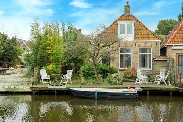 Vrijstaand vakantiehuis in Heeg met aanlegsteiger aan het water - thumbnail 1