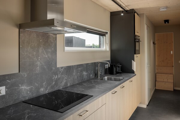 Vrijstaande lodge op autovrij park, 1 km van Noordzeestrand - thumbnail 3