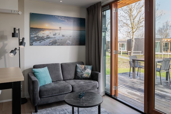 Tiny house met airco op autovrij Beach Resort Brouwersdam - thumbnail 2