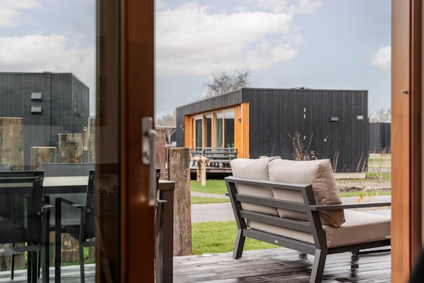 Moderne gelijkvloerse lodge op autovrij vakantiepark aan Brouwersdam - thumbnail 6