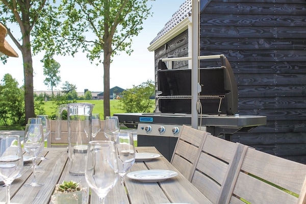 Luxe rietgedekte villa aan het water met sauna in Friesland - thumbnail 5
